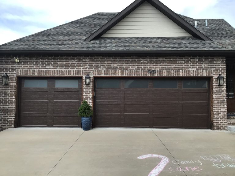 A new garage door by Clopay installed by Garage Door Guy