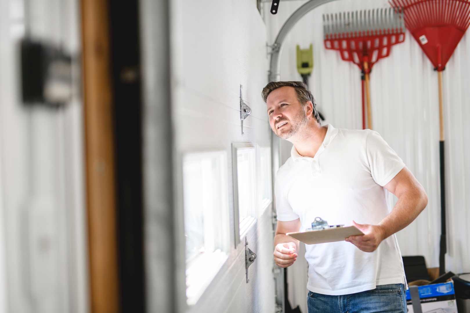 A technician performs a garage door inspection