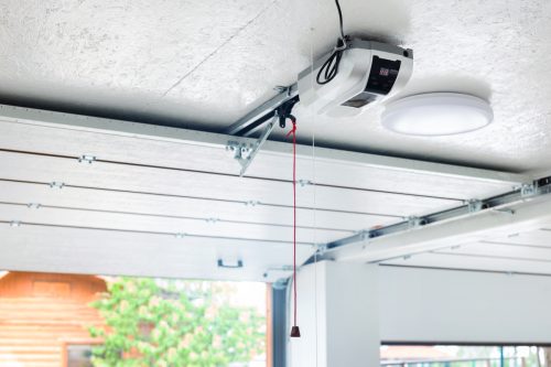 A garage door opener that is fully protected with a surge protector