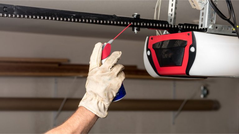 Professional provides garage door preventative maintenance