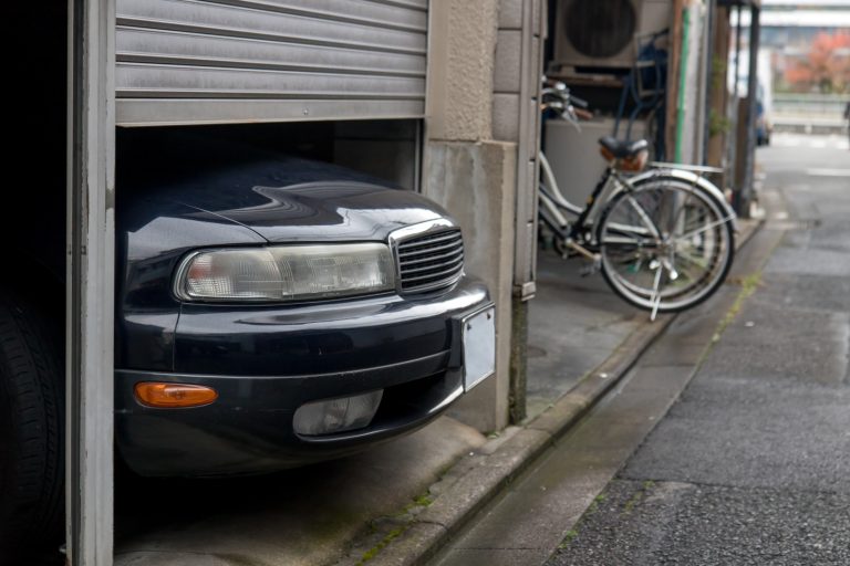 This garage door stuck halfway could have multiple culprits.