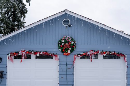 How to decorate a garage door safely is as important as how cool it looks like this garage door decorated with Christmas lights