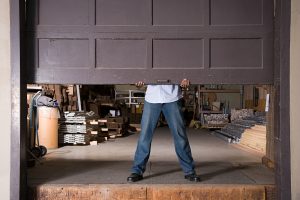 Man trying to figure out how to manually open garage door